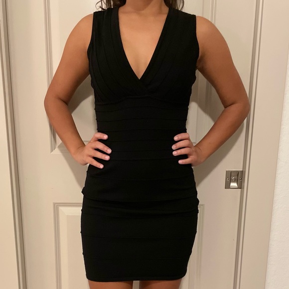 BCBGMaxAzria Dresses & Skirts - BCBGMaxAzria Black Wool Dress with Ribbed Detail